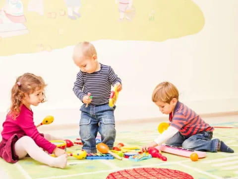 a group of children playing with toys