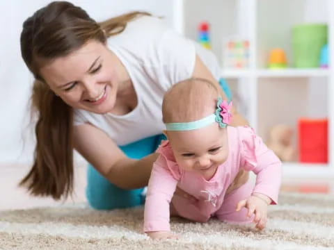 a person holding a baby