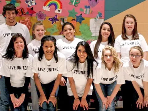 a group of people posing for a photo