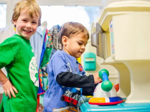 a couple of kids playing with toys