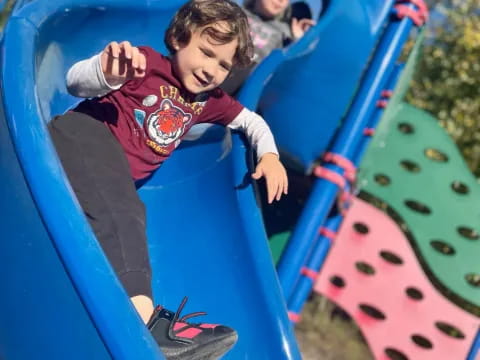 a boy on a slide