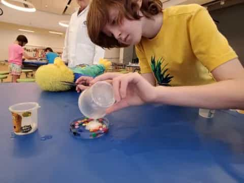 a woman playing with a toy