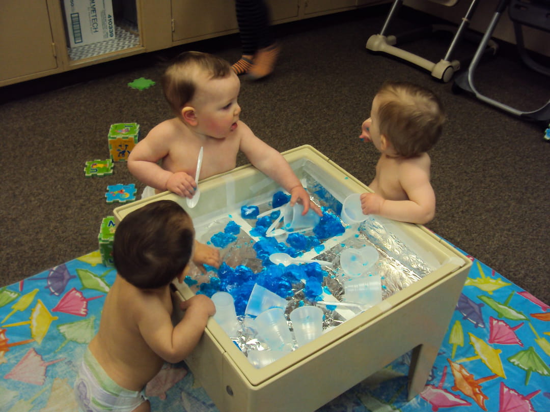 a group of kids playing with toys