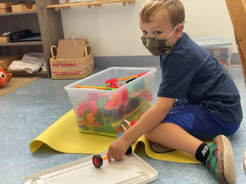 a boy wearing a mask