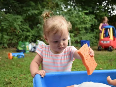 a child playing with a toy