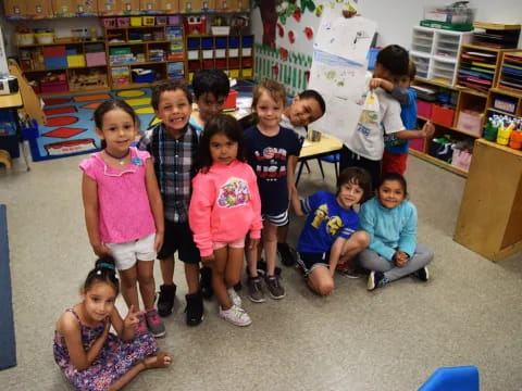 a group of children posing for a photo