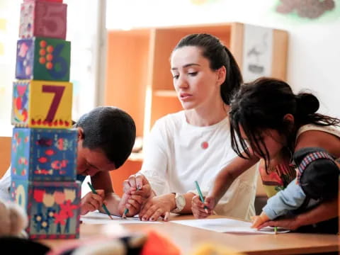 a teacher teaching her students