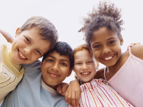 a group of children smiling