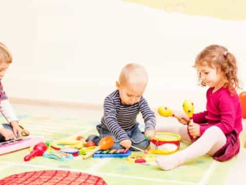 a group of children playing with toys