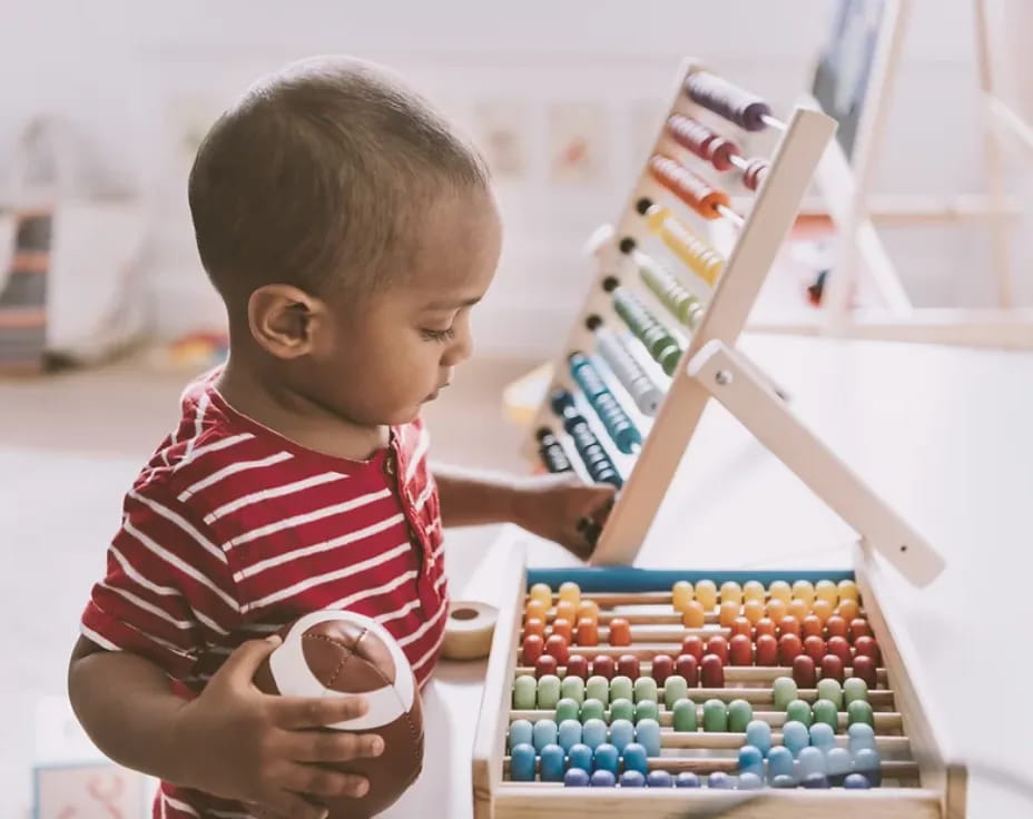 a child playing with a toy