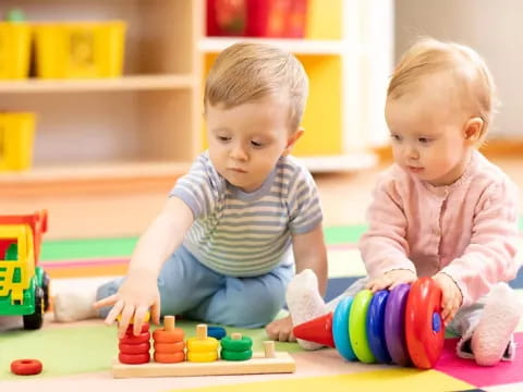 two children playing with toys