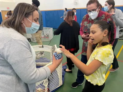 a person and a child in a hospital room