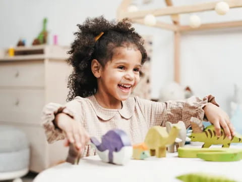 a baby playing with toys