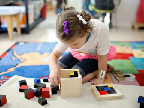 a child playing with blocks