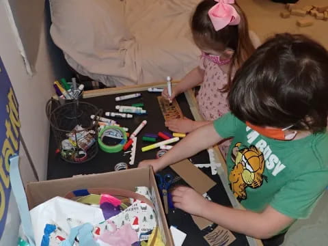 a couple of kids playing with toys