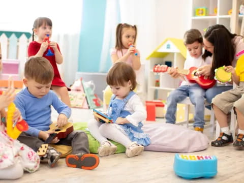 a group of children sitting on the floor