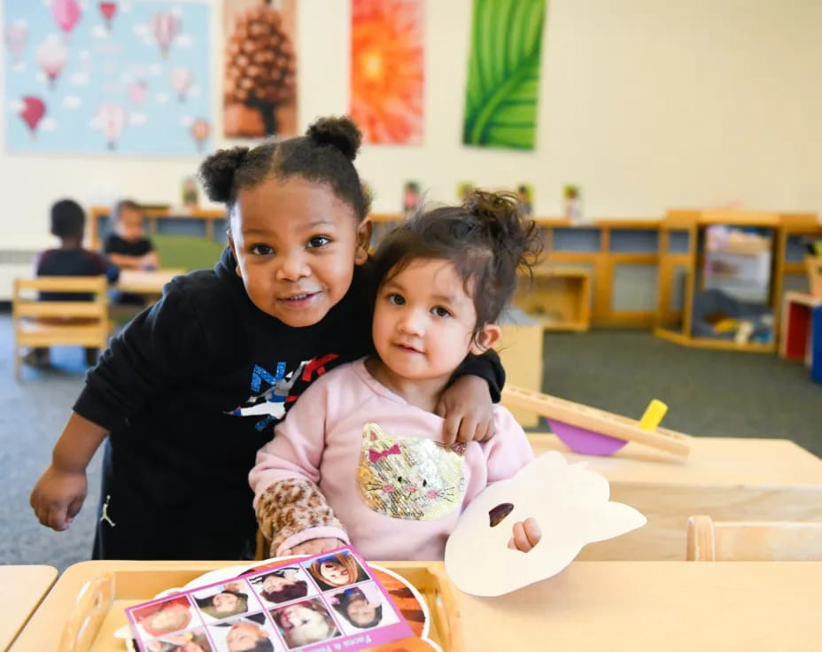 a boy and girl in a classroom