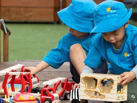 two kids playing with toys