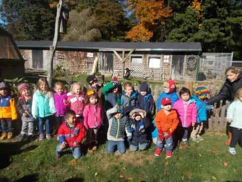 a group of children posing for a photo