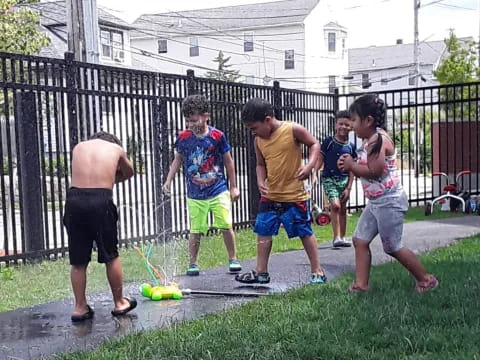 a group of people playing with balls