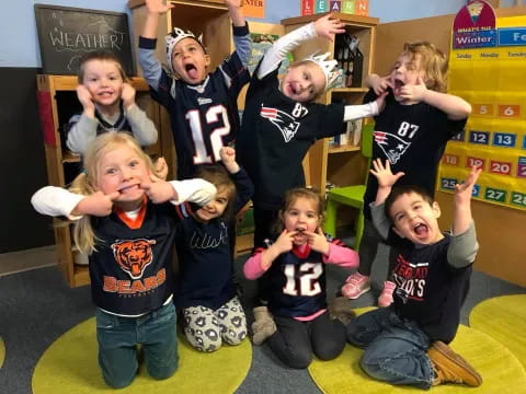 a group of kids posing for a photo