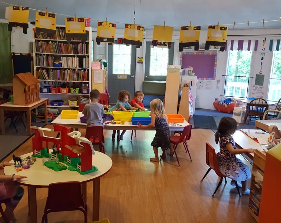 a group of children in a classroom