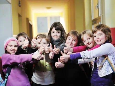 a group of children posing for a photo