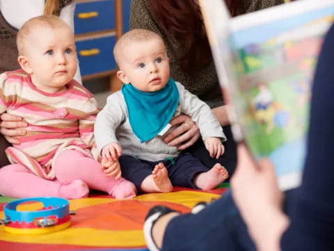 a person and two babies