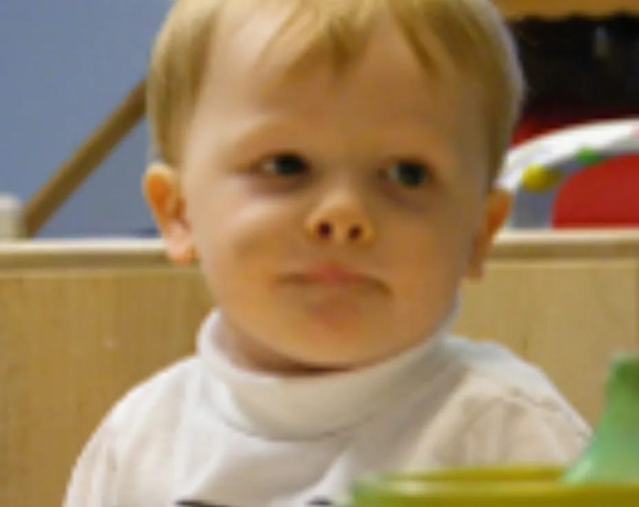 a child looking at the camera