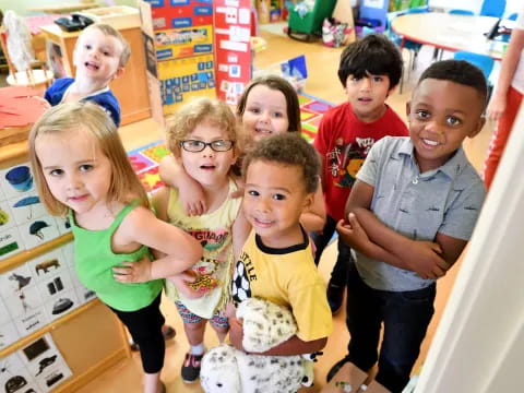 a group of children posing for a photo