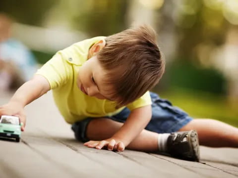 a child playing with a toy