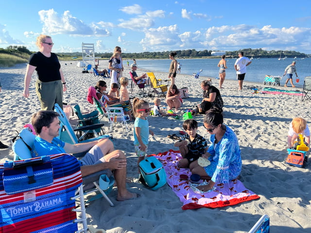 a group of people on a beach