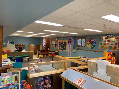 a room with shelves and toys