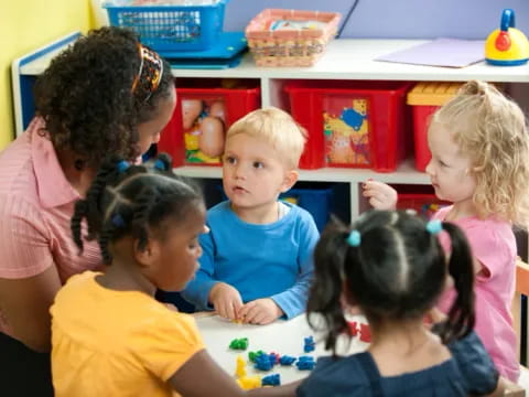 a group of children sitting in a classroom