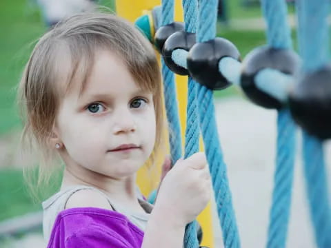 a little girl on a swing