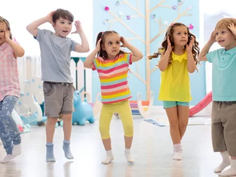 a group of kids posing for a picture