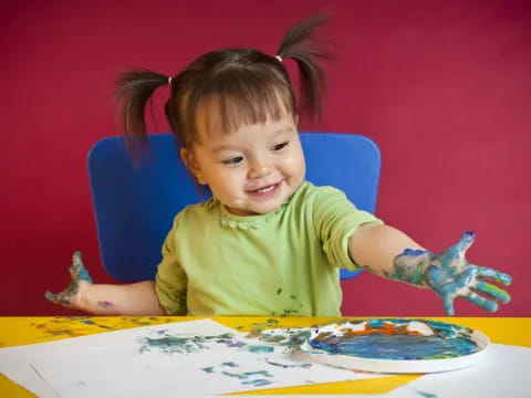 a child sitting at a table