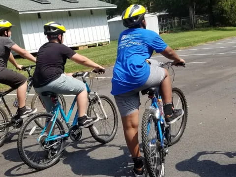 a group of people riding bikes
