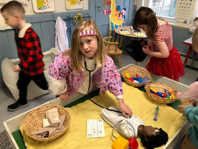 a group of children in a room