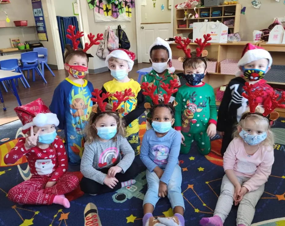 a group of children wearing clothing