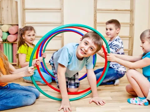 a group of children playing on the floor