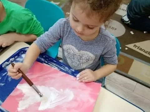 a young boy painting