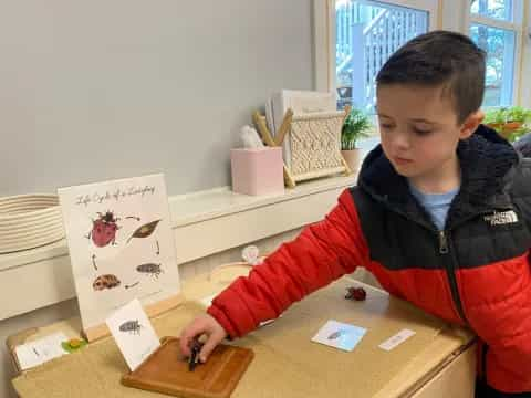 a child sitting at a table