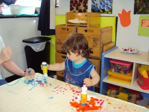 a child sitting at a table