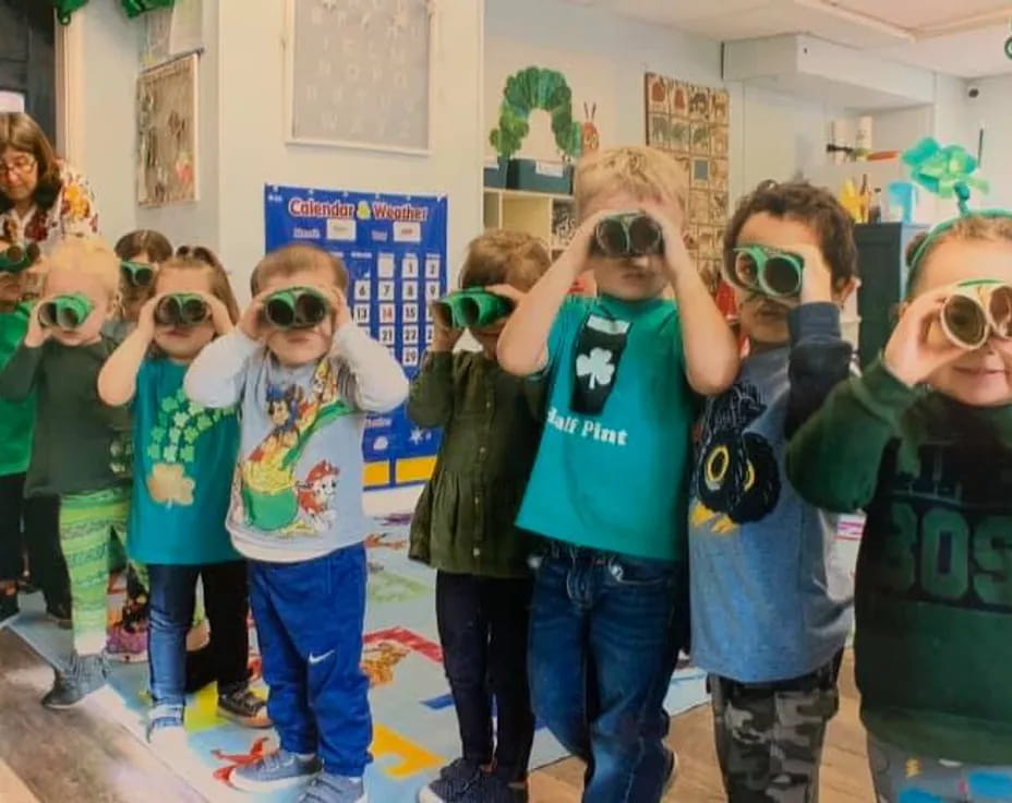 a group of children wearing masks