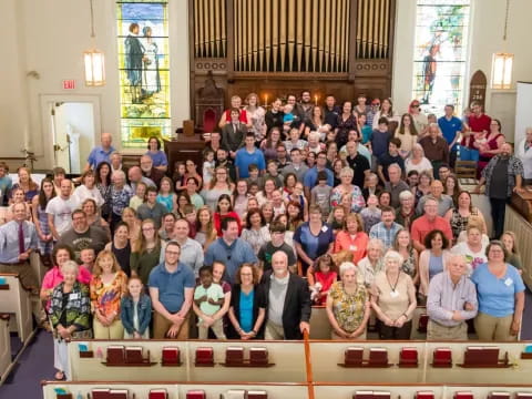 a group of people posing for a photo