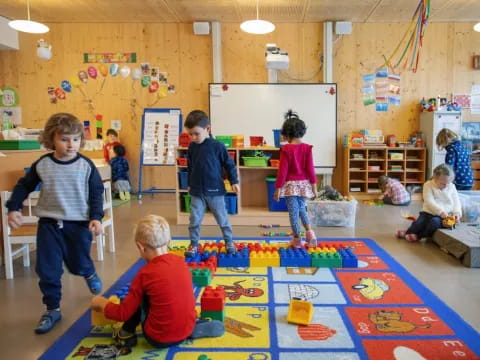 children playing with toys in a classroom