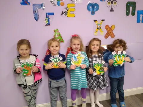 a group of children posing for a photo