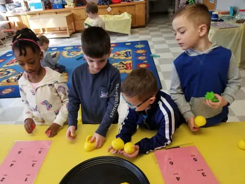 a group of children playing with toys