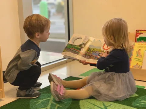 children reading a book